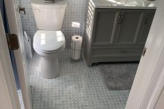 Image of new vanity and toilet installation by Martin Construction Services
