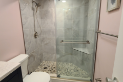 Image of custom shower remodel to walk-in style by Martin Construction Services